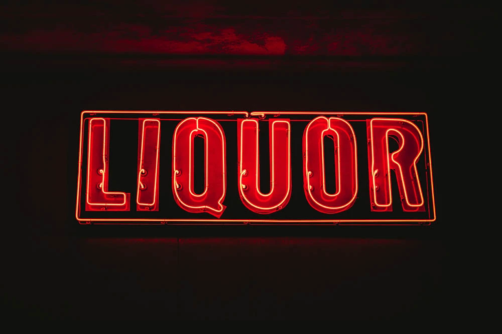 Image of a red liquor sign at a liquor store for sale in Canada