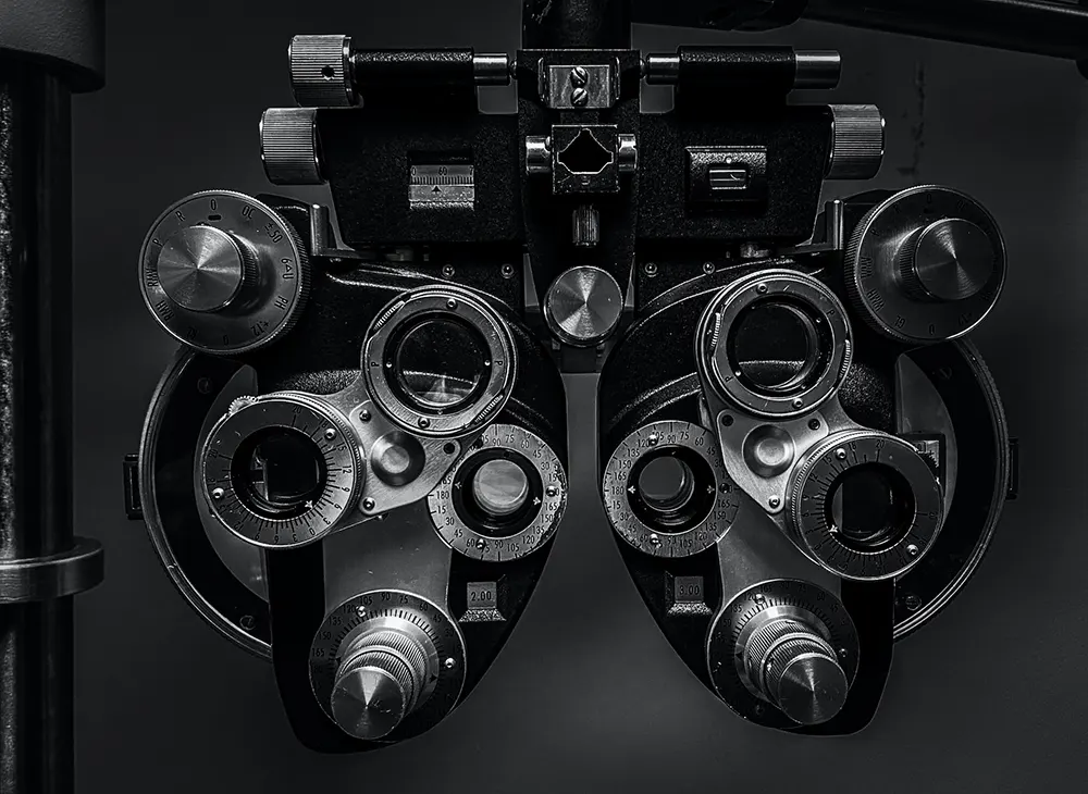 A black-and-white image of a phoropter at an optometry practice for sale in Canada