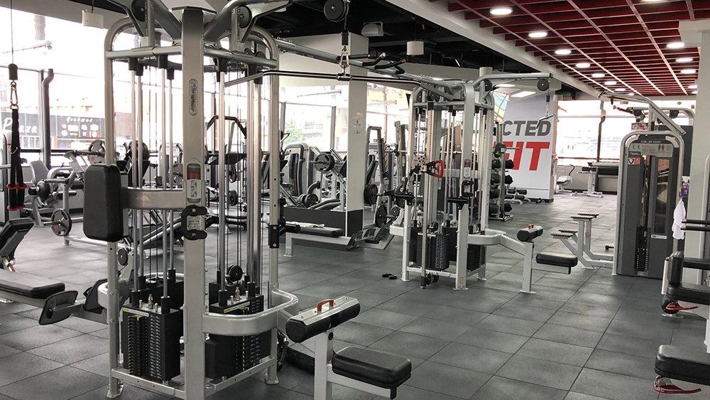 Image of equipment at an empty fitness business for sale in Canada